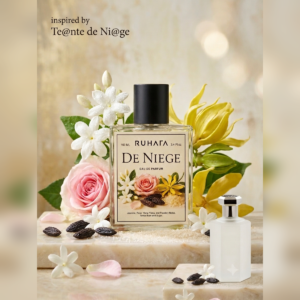 De Niege Eau De Parfume 100ml For Unisex De Niege by Ruhafa is a masterclass in powdery elegance. Designed for those who appreciate understated luxury, this fragrance captures the cozy warmth of sweet vanilla and musk blended with delicate, romantic florals. ​It’s not just a scent—it’s an unspoken statement of charm and purity. Wear it daily as your cozy signature scent or layer it for an extra touch of intimacy and allure. Fragrance Notes  Top Notes – Delicate Rose, Sweet Jasmine, Ylang-Ylang Heart Notes – Powdered Floral Accords, Tonka Bean, Rose Petals Base Notes – Soft Musk, Warm Amber, Vanilla, Heliotrope Fragrance Family : Powdery Floral Musk